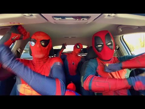 Two Spider-Man and Two Deadpool are dancing funny in the car